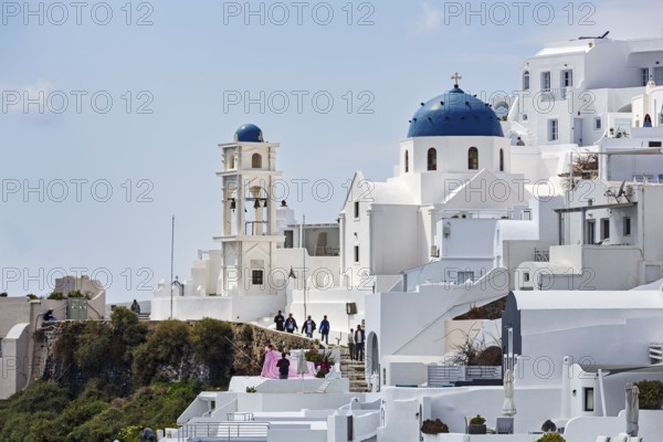 Local view, orthodox church Agios Anastasios with blue dome, Imerovigli, Thira, Santorini, Cyclades, Greece