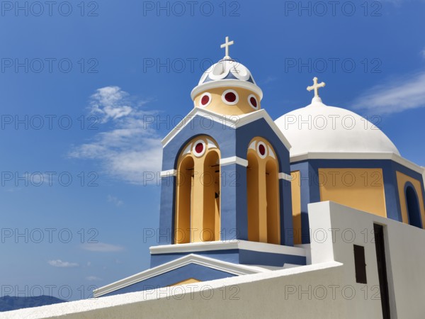 Catholic Church of Saint Stylianos, colourful facade, domes, Fira, Thira, Santorini, Cyclades, Greece
