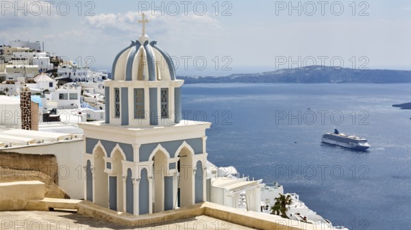 Blue and white bell tower and view of the sea, cruise ship, Firostefani, Thira, Santorini, Cyclades, Greece