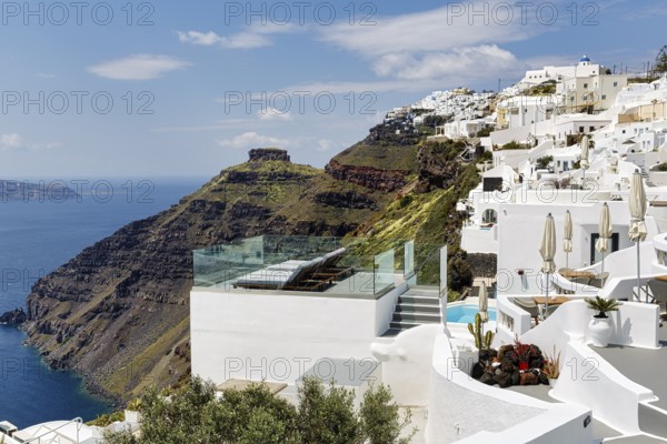 Sun terrace and white holiday homes, cliffs, caldera, Skaros rock formation, Firostefani, Thira, Santorini, Cyclades, Greece