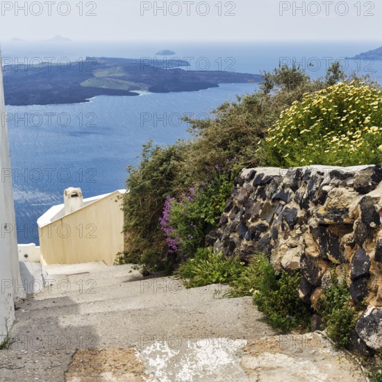 Hiking trail from Fira to Imerovigli, view of the caldera and the sea, Thira, Santorini, Cyclades, Greece