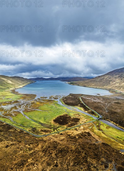 View from Eas a' Bhradain Waterfall from drone, Red Cuillin mountains, Loch Ainort, Isle of Skye, Scotland, UK