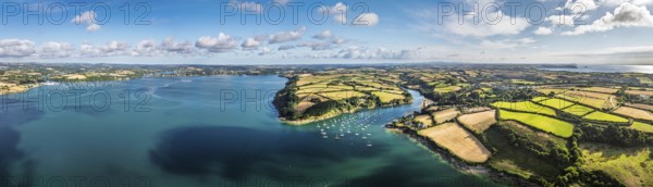 Panorama of Farms and Fields over St Mawes from drone, Carrick Roads, River Fal, Falmouth, Cornwall, UK
