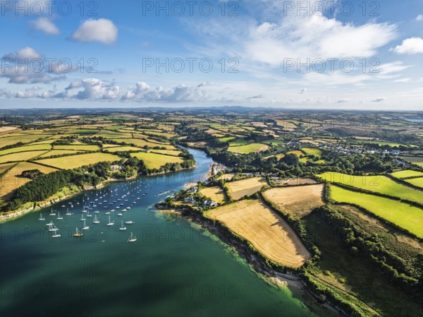 Farms and Fields over St Mawes from drone, Carrick Roads, River Fal, Falmouth, Cornwall, UK