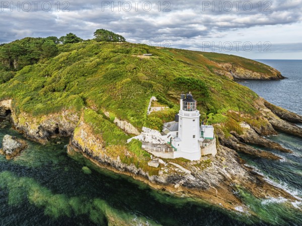St Anthony Lighthouse from drone, Roseland peninsula, Head circular walk, Cornwall, UK
