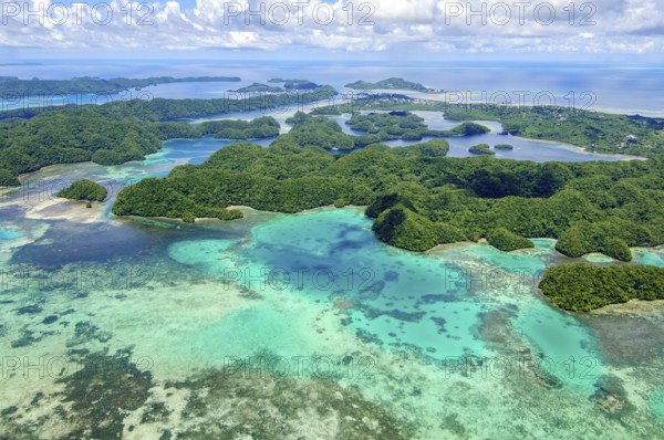 Aerial view of shallow turquoise lagoon of island paradise island state Palau in the Pacific West Pacific, Republic of Palau, Micronesia, Australia, Oceania