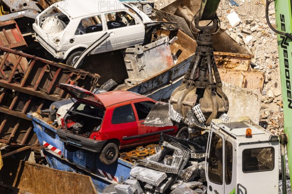 Scrap metal trade in the commercial harbour of Mannheim. Scrap vehicles and scrap metal. Mannheim, Baden-Württemberg, Germany