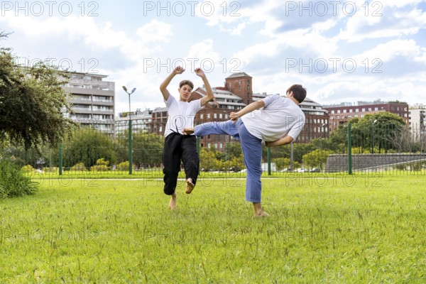 Powerful and graceful Taekwondo motion in a park
