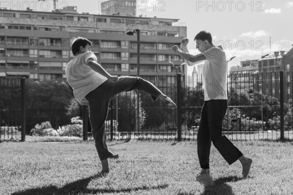 Two young men building skill and discipline through outdoor training