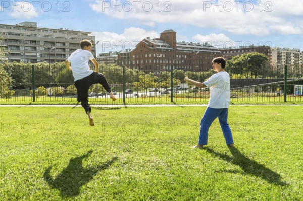Outdoor Taekwondo session building strength and skill