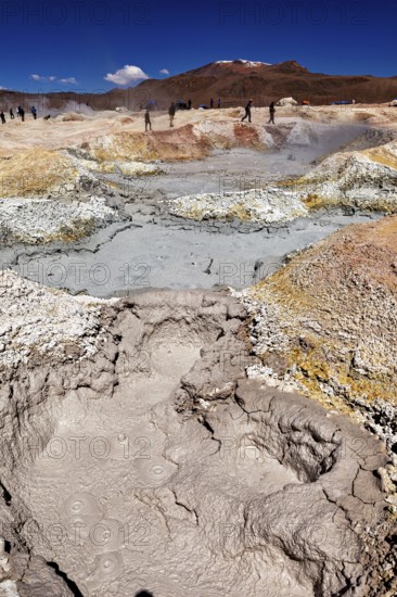 Vast geothermal activity area with fumaroles and people, The mud volcanoes and fumaroles on the Altiplano in Bolivia