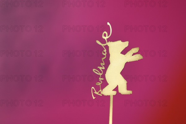 Background image, close-up, logo, golden bear with Berlinale lettering at a press conference during the 75th Berlin International Film Festival, Germany