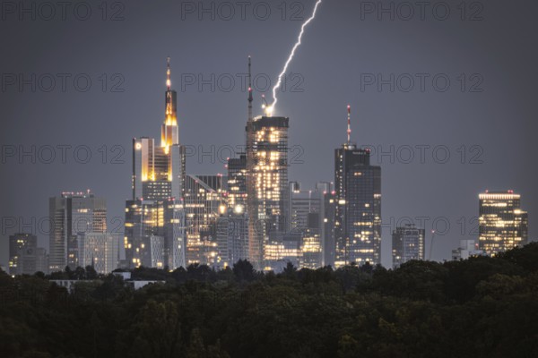 Lightning strikes over Frankfurt, force of nature in the centre of the city. City centre of Frankfurt am Main, Hesse, Germany