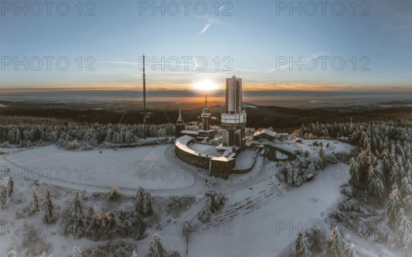 Winter landscape with atmospheric sunset. Großer Feldberg in the Taunus, Hesse, Germany