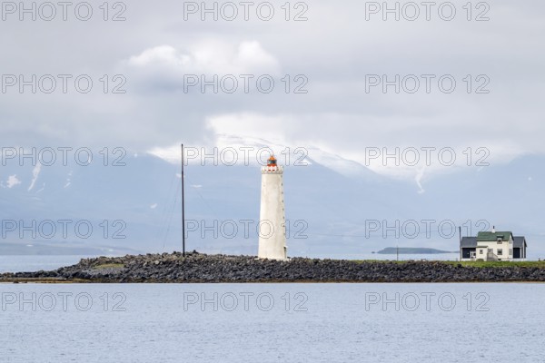 Grótta lighthouse on Iceland's coast in minimalist beauty. Seltjarnarnes, Reykjavik, Iceland