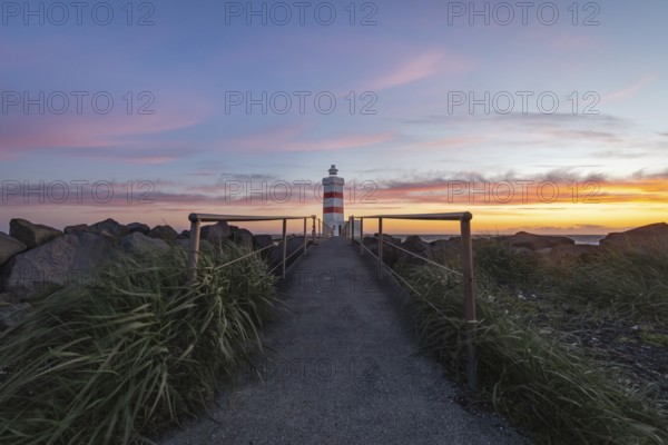 Gardur lighthouse at sunset. Gardur, Reykjanes, Iceland