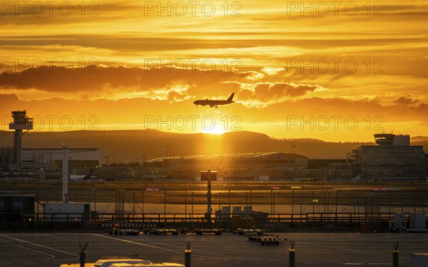 Silhouette of a jet at sunset. Frankfurt Airport, Hesse, Germany
