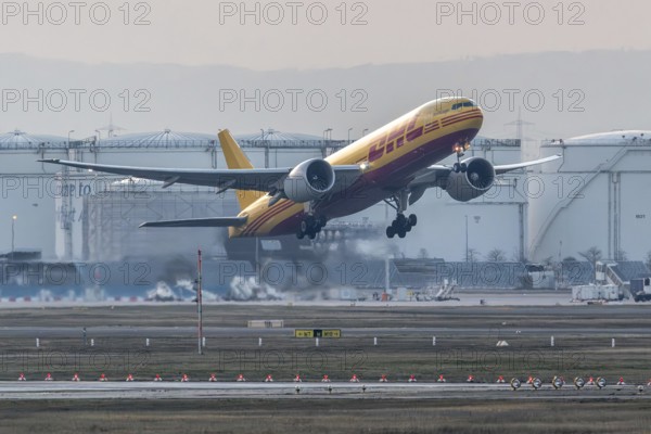 DHL cargo plane takes off with a full load. Frankfurt am Main Airport, Hesse, Germany