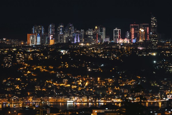 Sparkling skyline meets vibrant city lights on the Bosphorus. Istanbul, Turkey