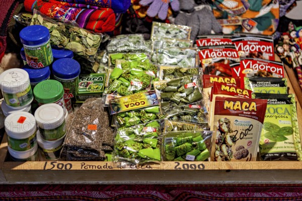Market stall with a selection of coca products and traditional medicinal items in colourful packaging, The market with souvenir shops in San Pedro de Atacama in Chile