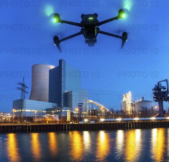 Symbolic image, photomontage, reconnaissance, spying with drones in industrial plants, critical infrastructure, drone flies towards an industrial complex, power plant, spying by camera drones