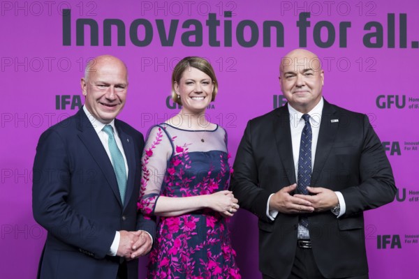 Kai Wegner (Governing Mayor of Berlin, CDU), Sara Warneke (Managing Director of gfu Consumer & Home Electronics GmbH) and Leif-Erik Lindner (Managing Director of IFA Management GmbH) in front of the opening gala of IFA Funkausstellung in the CityCube, Berlin, 4 September 2025
