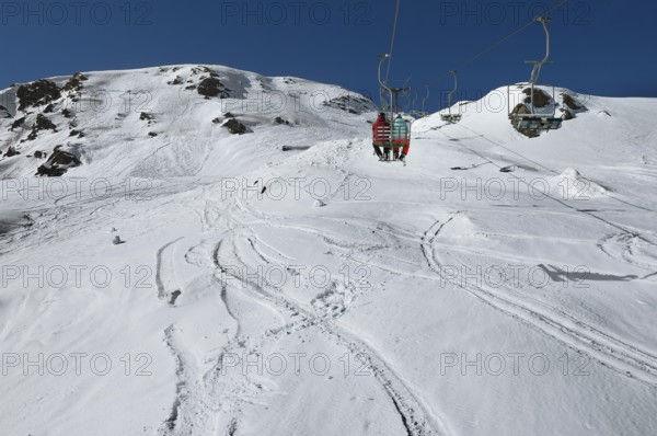 Chairlift, Alpe Tognola ski area, San Martino di Castrozza, Trentino, South Tyrol, Italy
