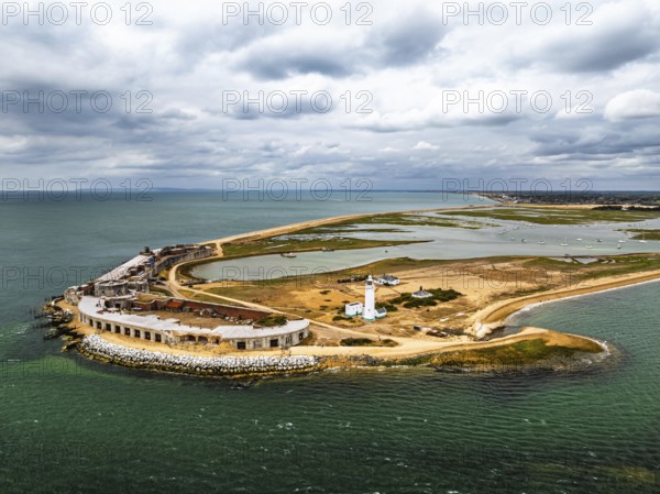 Hurst Point Lighthouse and Hurst Castle from drone over Hurst Spit, Milford on Sea, Lymington, Hampshire, England, United Kingdom
