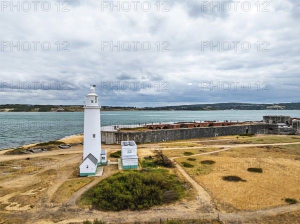 Hurst Point Lighthouse and Hurst Castle from drone over Hurst Spit, Milford on Sea, Lymington, Hampshire, England, United Kingdom