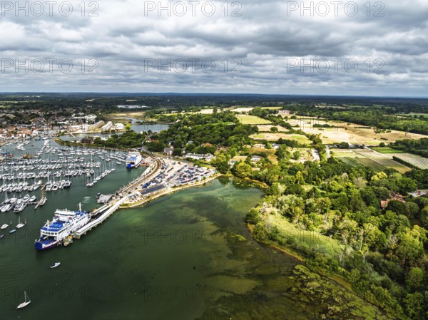 Wight Light car ferry to Isle of Wight on Lymington River and marina from drone, Lymington, New Forest, Hampshire, England, United Kingdom
