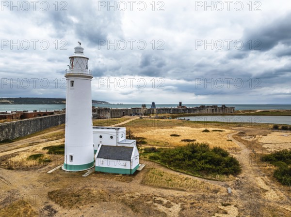 Hurst Point Lighthouse and Hurst Castle from drone over Hurst Spit, Milford on Sea, Lymington, Hampshire, England, United Kingdom