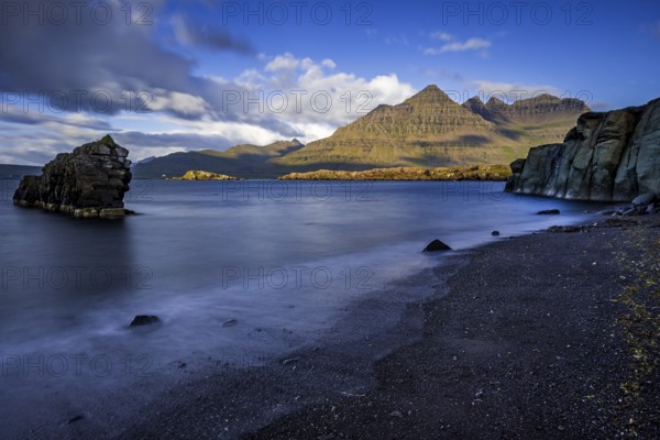 Sea, surf, beach, shore, cliff, mountains, clouds, morning light, long exposure, summer, Berufjördur, Blabjörg cliffs, Teigarhorn behind, East Fjords, Iceland