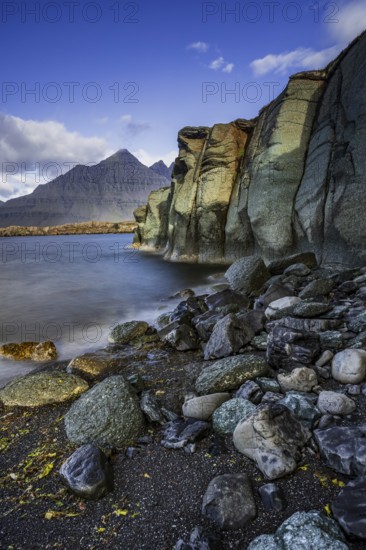 Sea, surf, beach, shore, cliff, mountains, clouds, morning light, long exposure, summer, Berufjördur, Blabjörg cliffs, Teigarhorn behind, East Fjords, Iceland