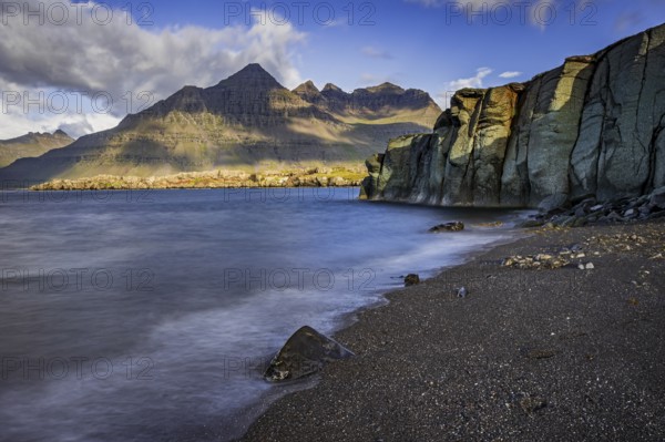 Sea, surf, beach, shore, cliff, mountains, clouds, morning light, long exposure, summer, Berufjördur, Blabjörg cliffs, Teigarhorn behind, East Fjords, Iceland