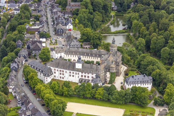 Aerial view, Berleburg Castle, residence castle of the Sayn-Wittgenstein family, Bad Berleburg, Wittgensteiner Land, North Rhine-Westphalia, Germany, aristocratic family, architecture, exterior view, castle, monument, heritage, Europe, Sayn-Wittgenstein family, building, history, green spaces, culture, landscape, aerial view, nature, panorama, residence castle, castle, castle complex, sight, summer, daylight, tourism, tradition, forest, historical, rural