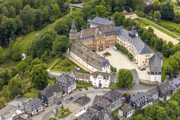 Aerial view, Berleburg Castle, residence castle of the Sayn-Wittgenstein family, Bad Berleburg, Wittgensteiner Land, North Rhine-Westphalia, Germany, aristocratic family, architecture, exterior view, castle, trees, monument, drone image, Sayn-Wittgenstein family, building, green area, local history, sky, cultural heritage, landscape, Middle Ages, panorama, park, region, residence castle, castle, sight, summer, tourism, forest, European, historical