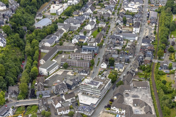 Aerial view, Johannes-Althusius-Gymnasium, district court and police station, St. Marien Kirche, Sparkassen Gebäude, Poststraße Bundesstraße B480, Bad Berleburg, Wittgensteiner Land, North Rhine-Westphalia, Germany, Amtsgericht, architecture, view, bank, Bundesstraße B480, drone shot, building, court, infrastructure, institutions, church, landscape, village, perspective, police station, Poststraße, school, town, town planning, town centre, streets, urban, traffic, administration, administration building, bird's eye view, German town, historic building, religious building, public space