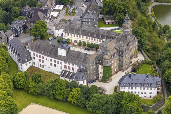 Aerial view, Berleburg Castle, residence castle of the Sayn-Wittgenstein family, Bad Berleburg, Wittgensteiner Land, North Rhine-Westphalia, Germany, nobility, architecture, property, monument, heritage, Sayn-Wittgenstein family, building, green, culture, landscape, nature, panorama, residence, residence castle, castle, sight, summer, city, day, tourism, environment, landmark, historical, rural