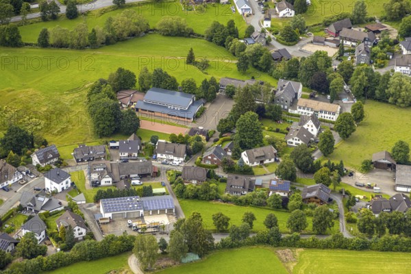 Aerial view, primary school in Odeborntal and Waldorf day care centre Sonnenblume, kindergarten, Wemlighausen, Bad Berleburg, Wittgensteiner Land, North Rhine-Westphalia, Germany, architecture, educational institution, trees, village, roofs, facilities, education, building, ensemble of buildings, community, primary school, green spaces, children, childcare, kindergarten, day care centre, learning, Odeborntal, school, playground, roads, forest, Waldorf day care centre Sonnenblume, paths, rural