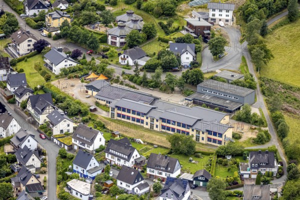 Aerial view, Municipal Primary School Am Burgfeld, Bad Berleburg, Wittgensteiner Land, North Rhine-Westphalia, Germany, Am Burgfeld, architecture, exterior view, educational institution, education, roof, German, building, terrain, green areas, infrastructure, landscape, location, aerial view, school, school building, town, streets, structure, municipal primary school, surroundings