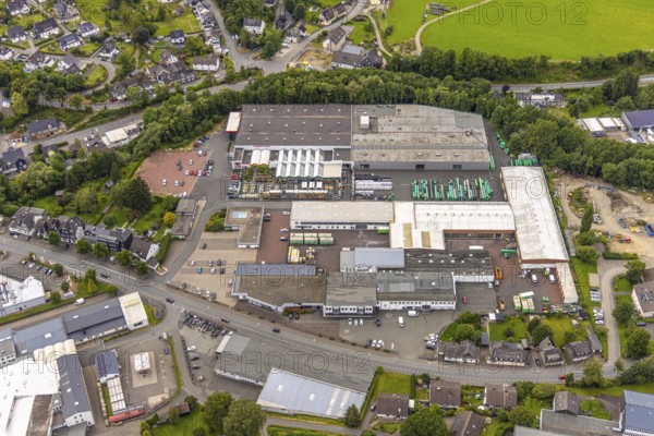 Aerial view, commercial area and shopping centre with Hagebaumarkt, Sählingstraße, Bad Berleburg, Wittgensteiner Land, North Rhine-Westphalia, Germany, architecture, cars, exterior, shopping trolley, shopping centre, retail, development, building, shops, business, commercial area, Hagebaumarkt, trade, industrial area, infrastructure, landscape, organisation, parking, summer, town, town planning, street, day, urbanisation, traffic, supply