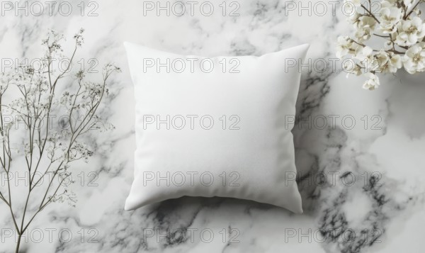 A soft white pillow on a marble surface with delicate flowers under gentle lighting. AI generated