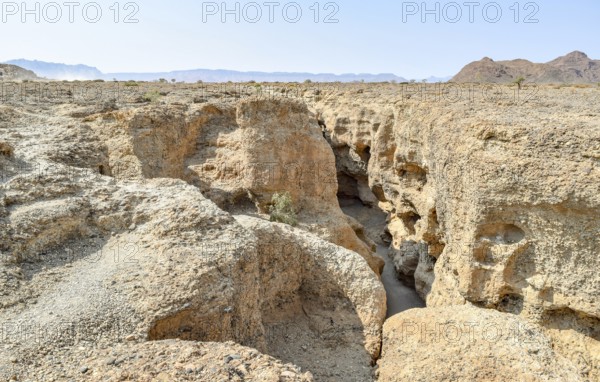 Sunny illuminated rocky landscape seen in Namibia