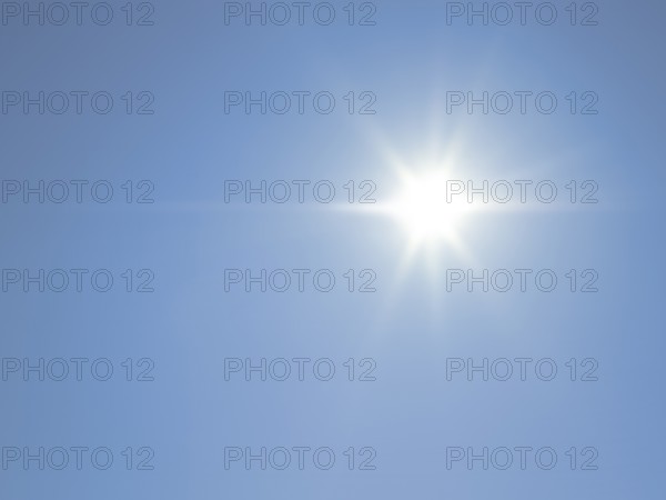Abstract background showing the sun in blue sky