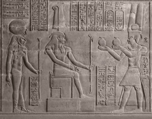 Ancient stone relief at Chnum temple in Egypt