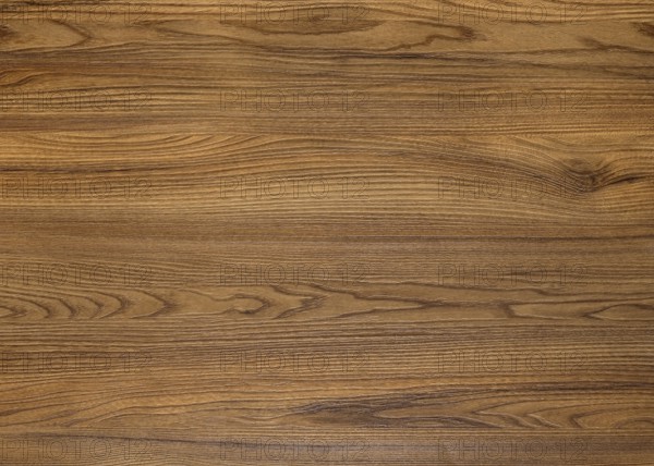 A full frame brown wood grain surface