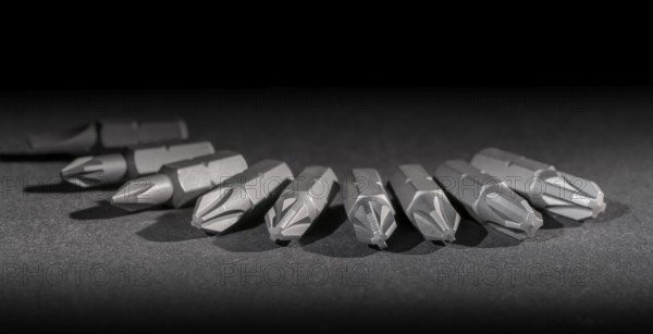 Set of screwdriver bits in dark ambiance