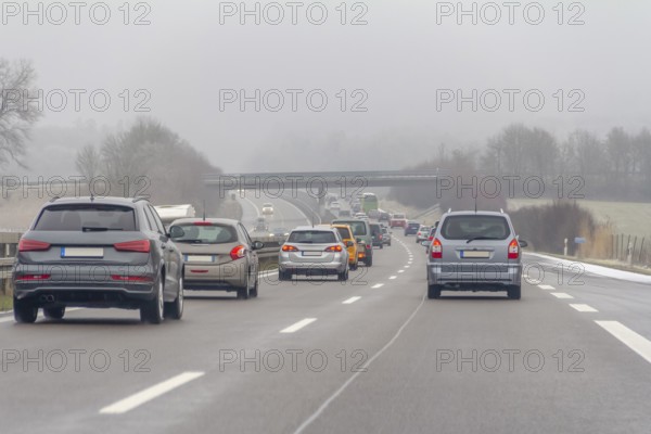 Misty highway scenery at winter time in Southern Germany