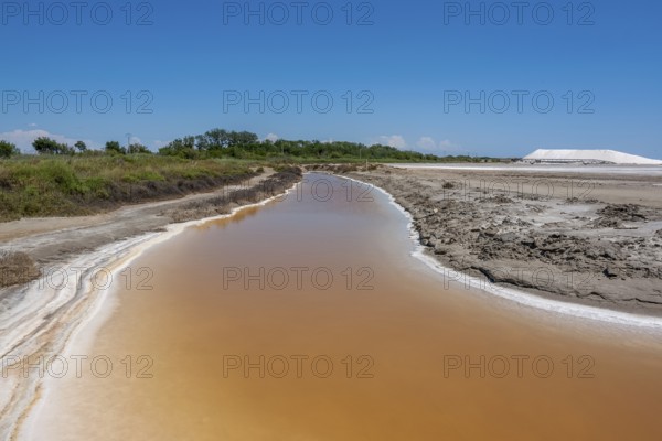 Scenery around Salin-de-Giraud located in in the Camargue area in southern France wich is showing lots of salt evaporation ponds in sunny ambiance