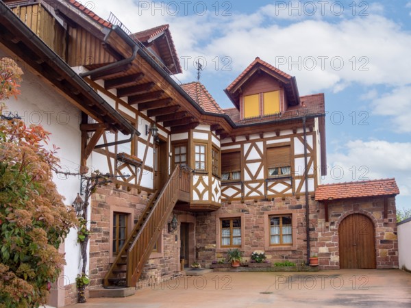 Idyllic traditional half-timbered house located at the Southern Wine Route area in Rhineland-Palatinate in Germany